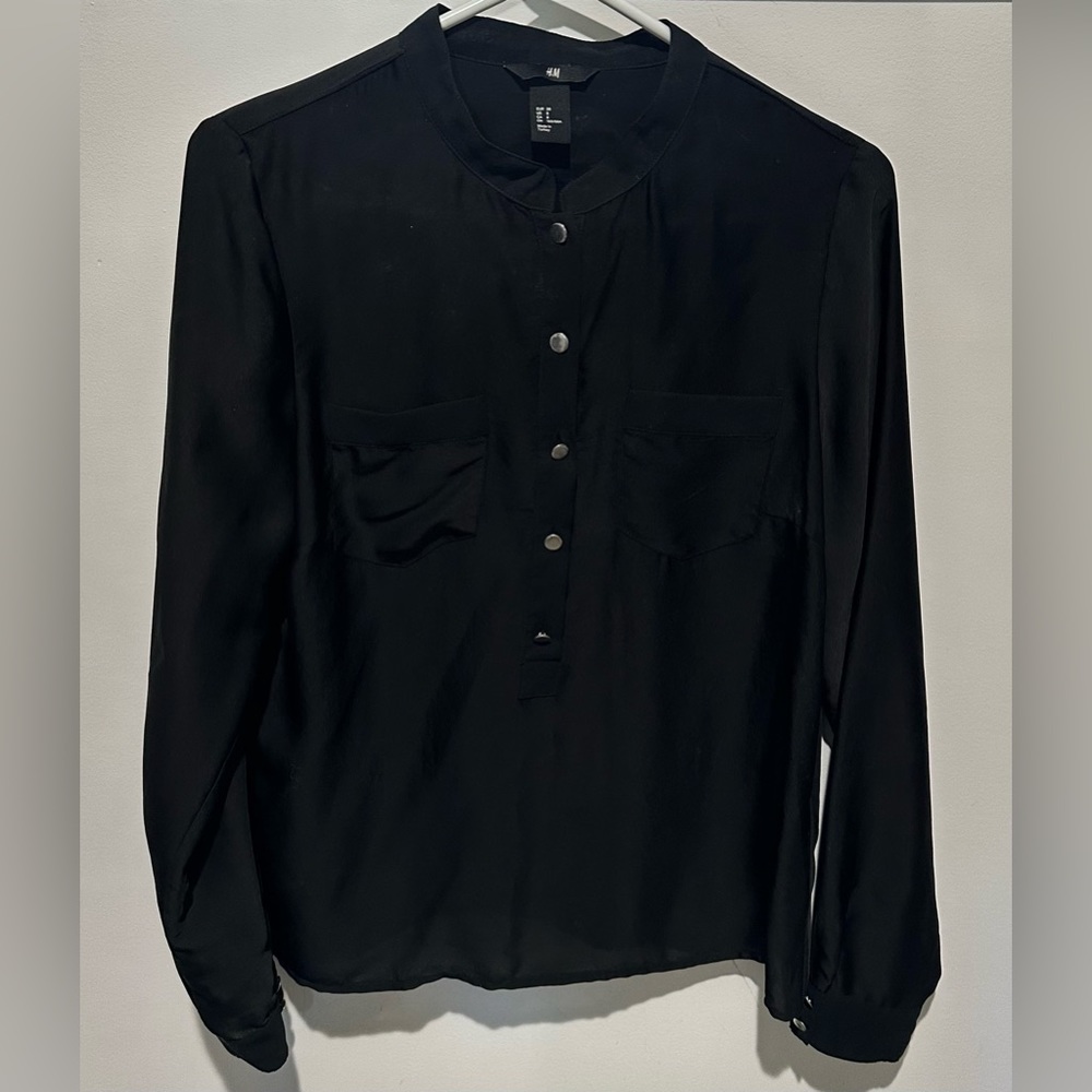 Rarely worn H&M black blouse with gold button accents (Size US 8)